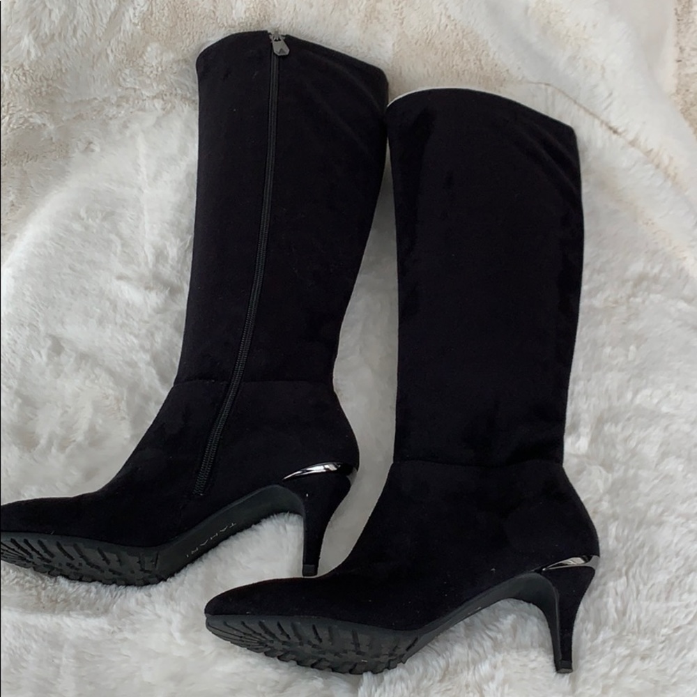 Tahari black suede boots.